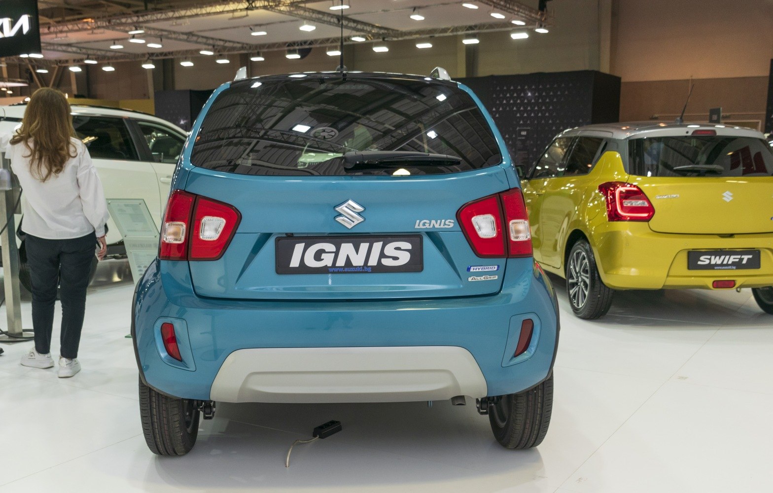 Rear view of compact hybrid SUV featuring taillights and AllGrip badge