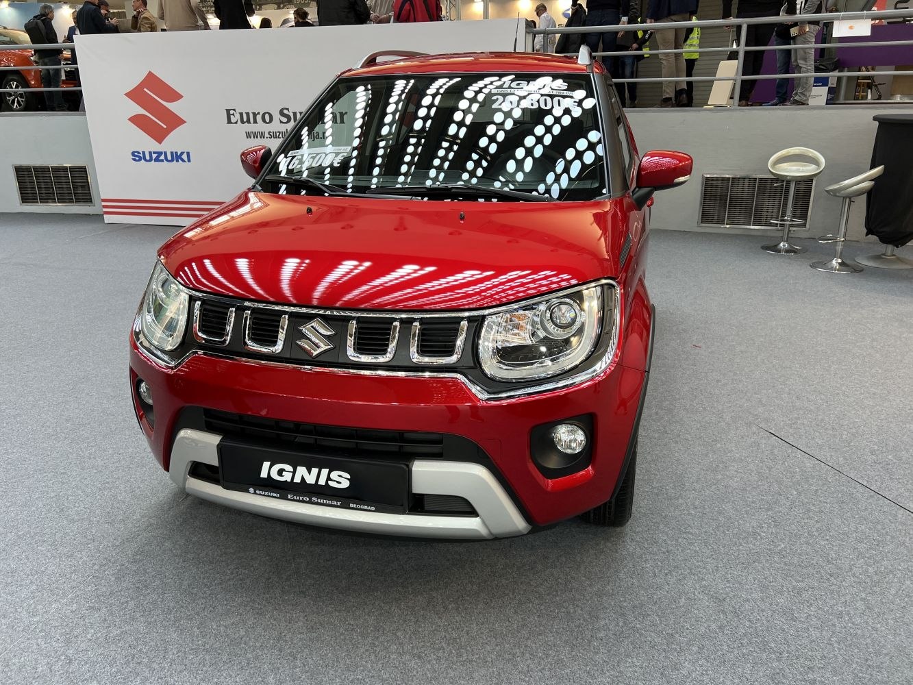 Front view with distinctive grille and headlight design