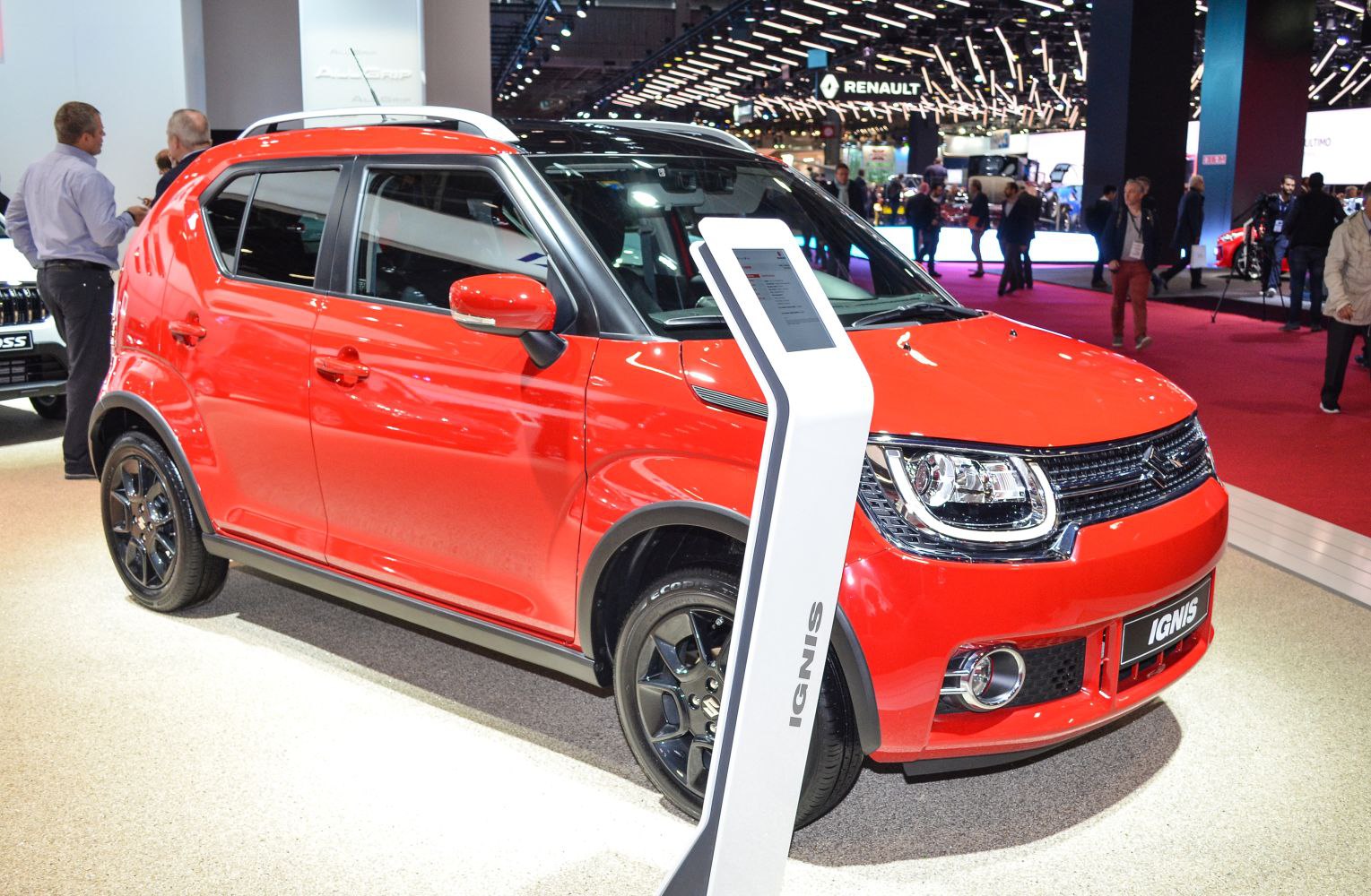 Red compact SUV with LED headlights and black alloy wheels