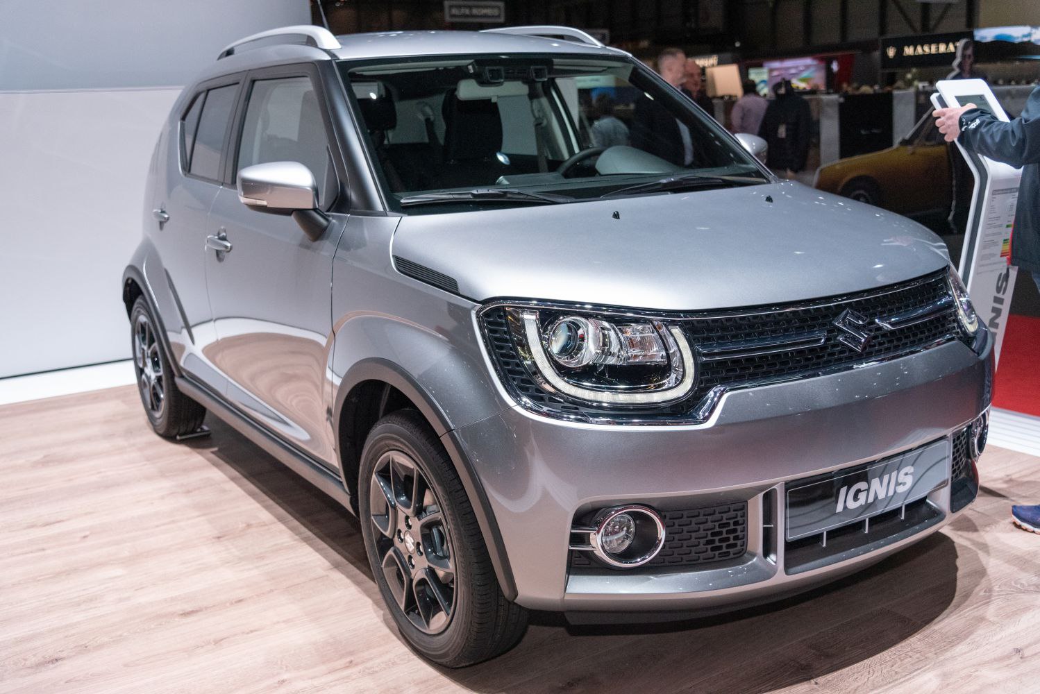 Modern compact SUV front with LED headlights and alloy wheels