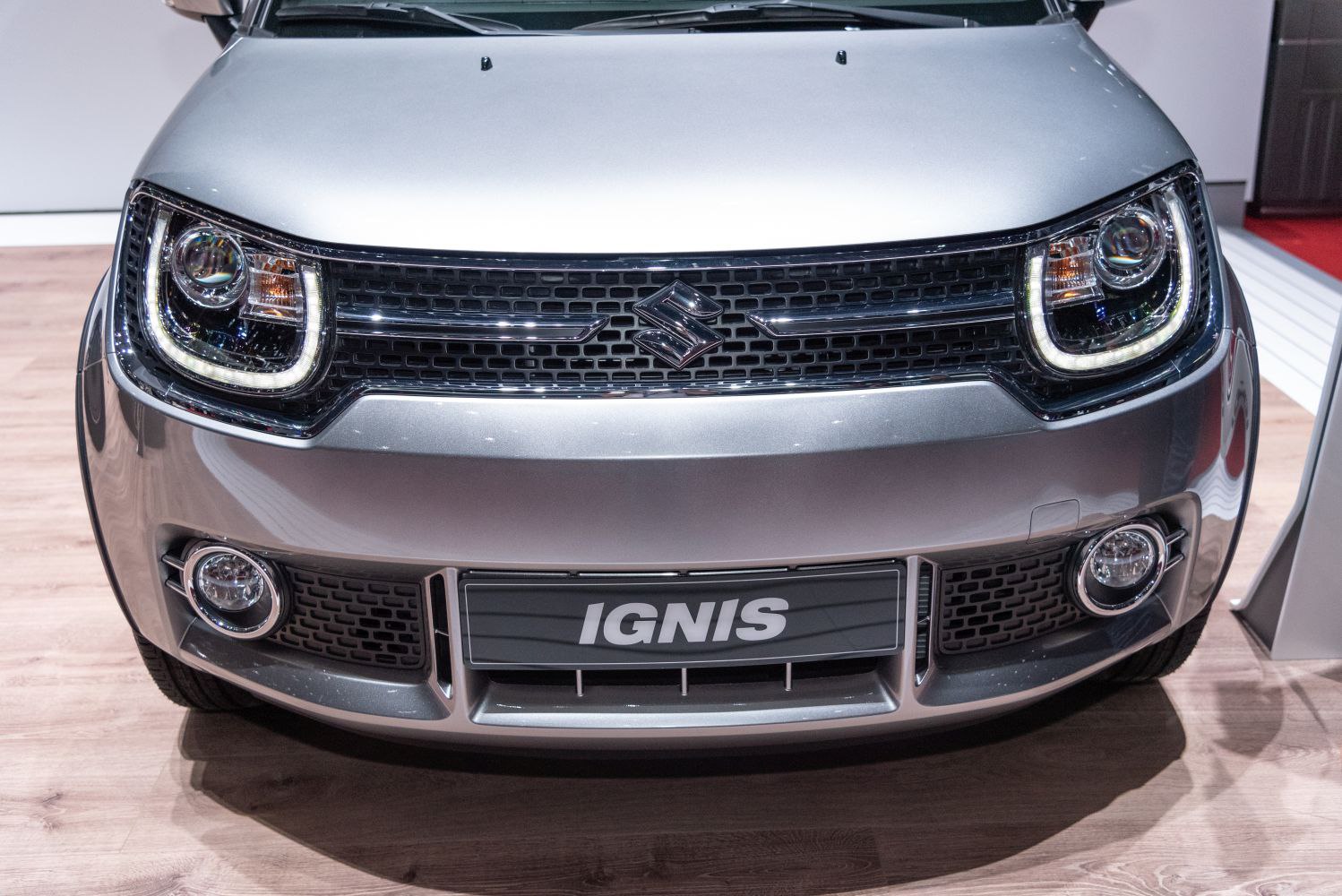 Close-up of front grille with LED headlights and fog lights