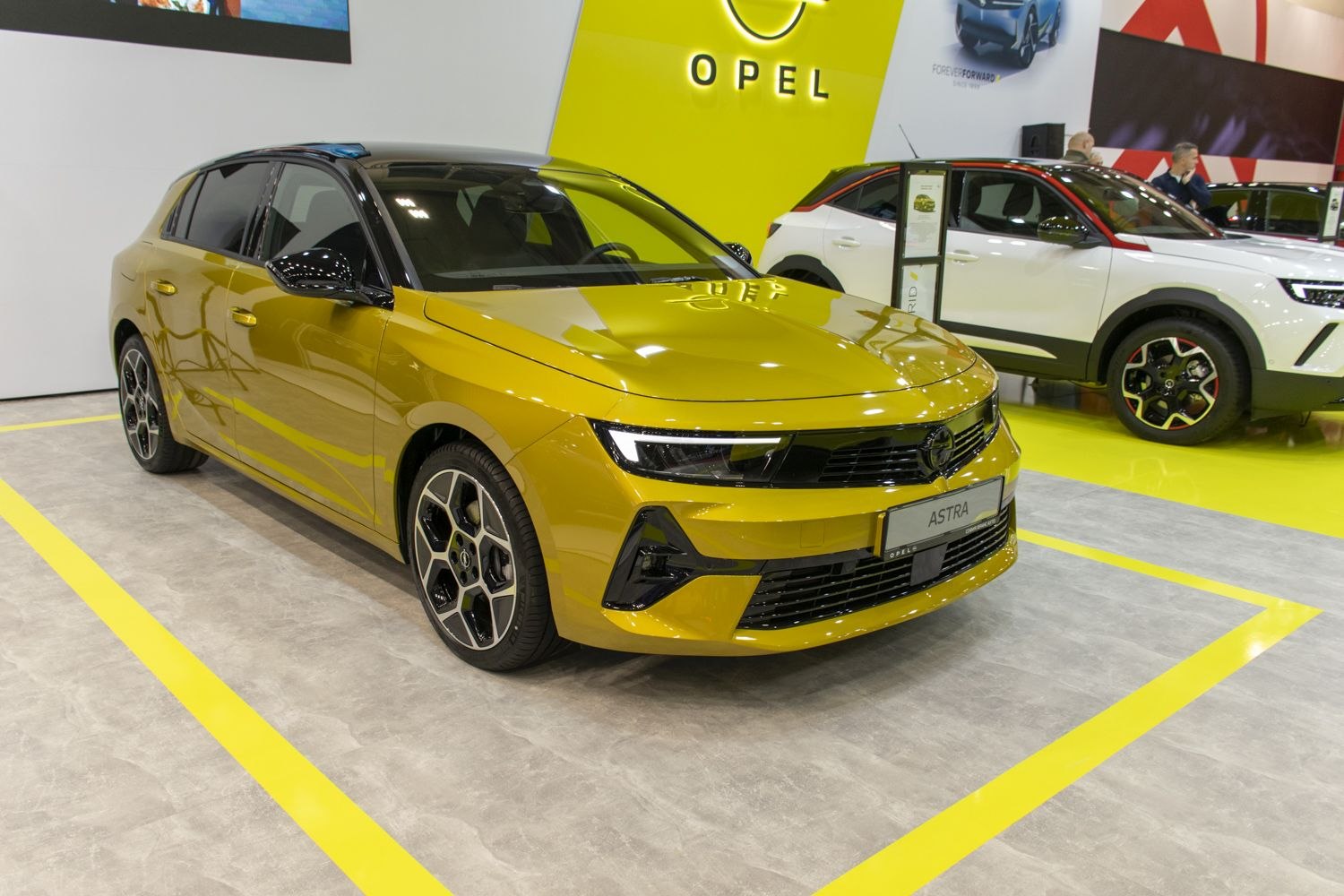 Front view with LED headlights and modern grille