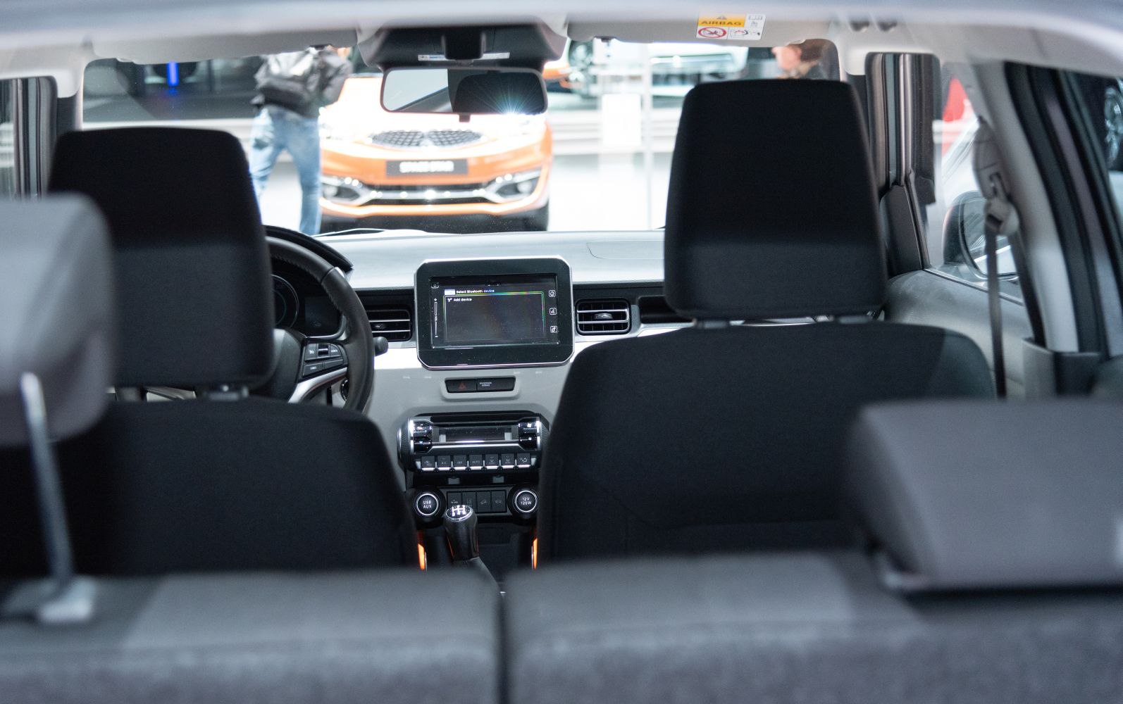 Interior dashboard with infotainment display and manual gear shift