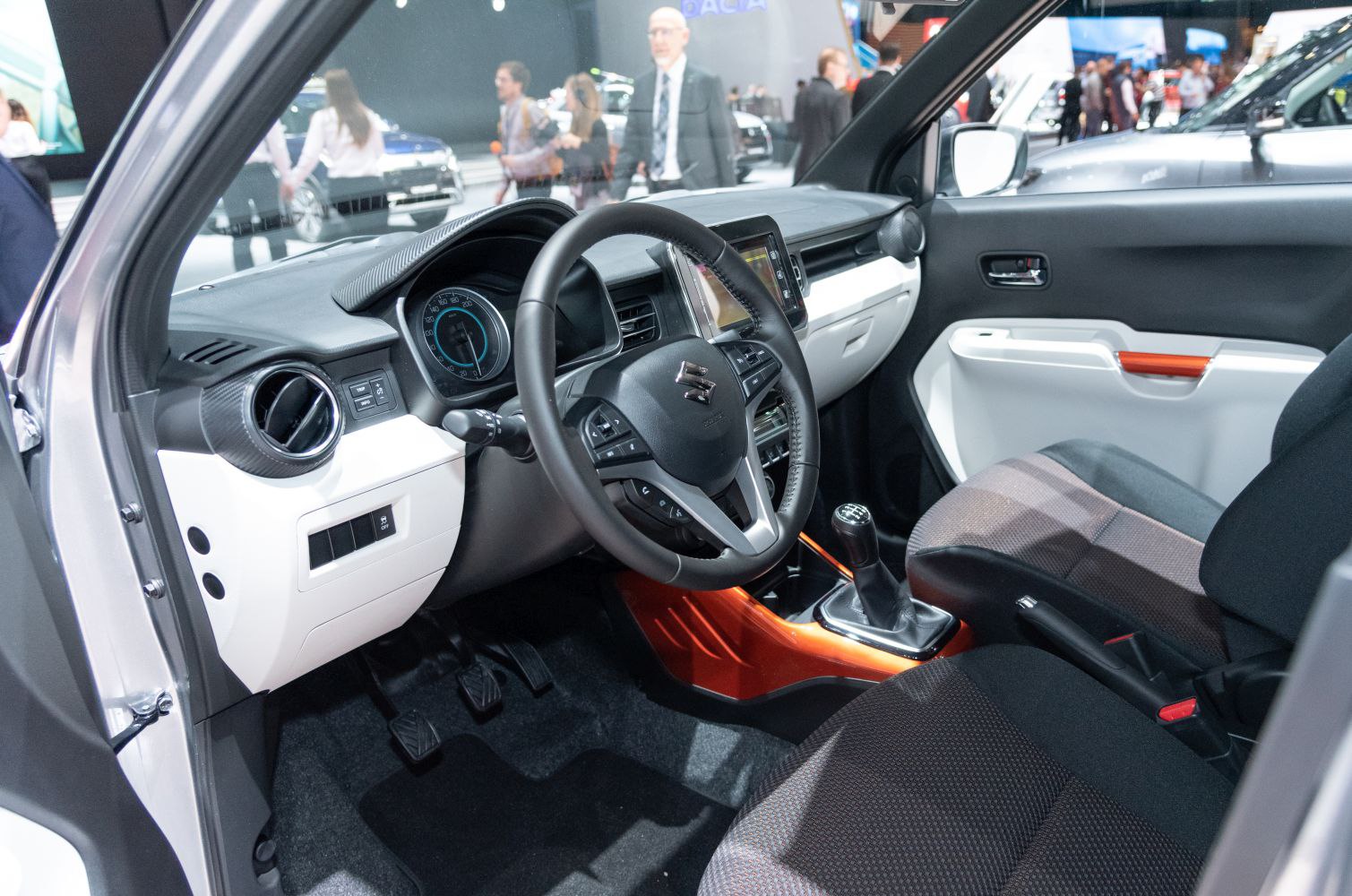 Dashboard and manual gearshift interior with steering wheel and pedals