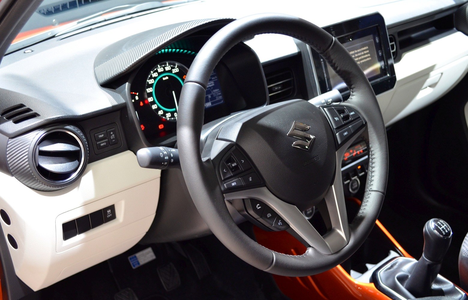 Steering wheel and dashboard with gear stick interior features