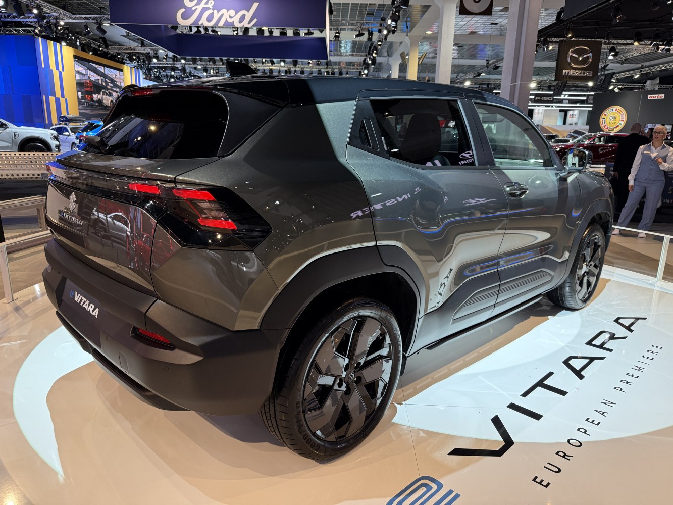 Rear side view of compact SUV with LED taillights and black alloy wheels