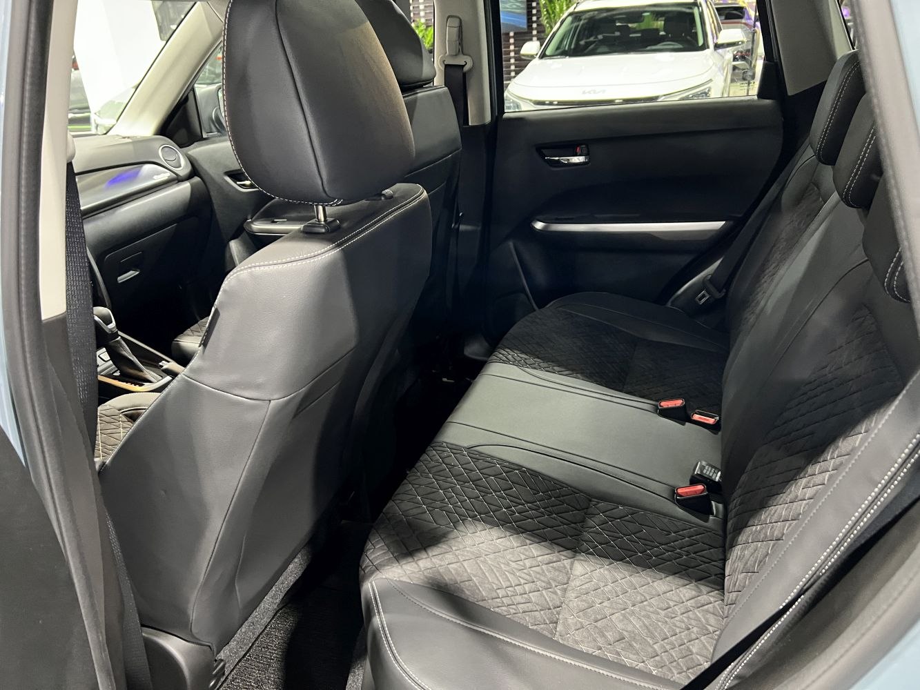 Rear seat interior with quilted upholstery and spacious design