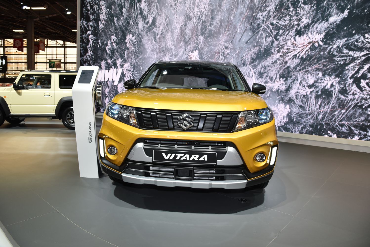 Front view of SUV featuring updated grille and headlights