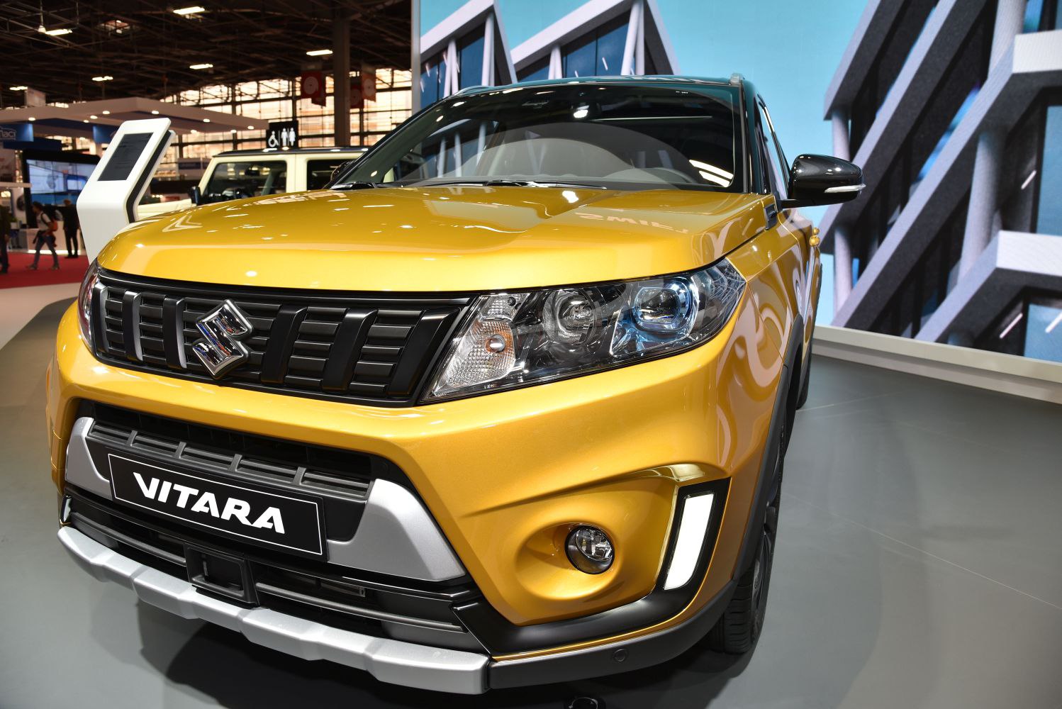 Close-up of SUV front with LED headlights and bold grille