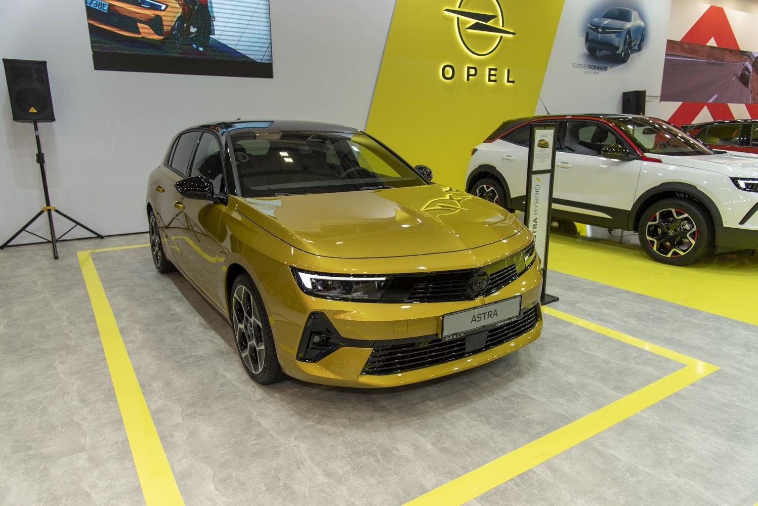 Sleek modern hatchback front with sharp headlights