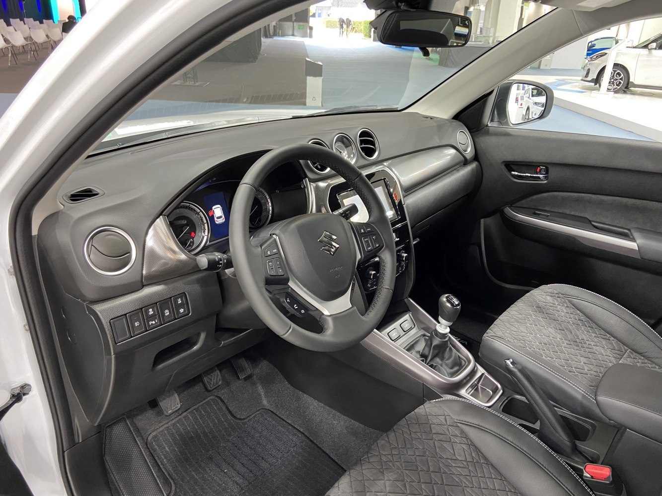 Interior cockpit with manual transmission and digital dashboard