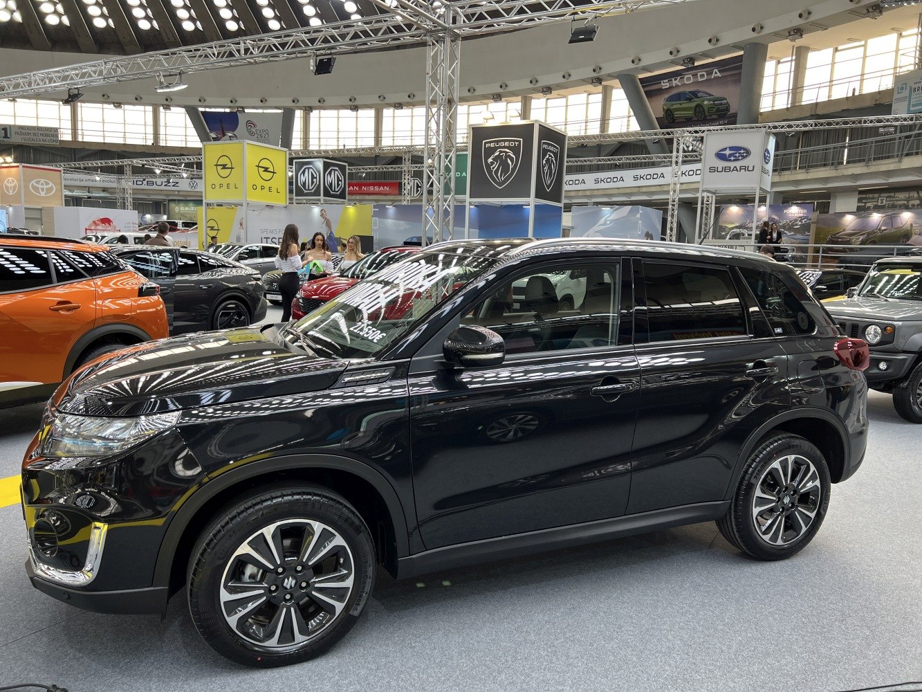 Compact SUV with LED headlights and alloy wheels in side profile.
