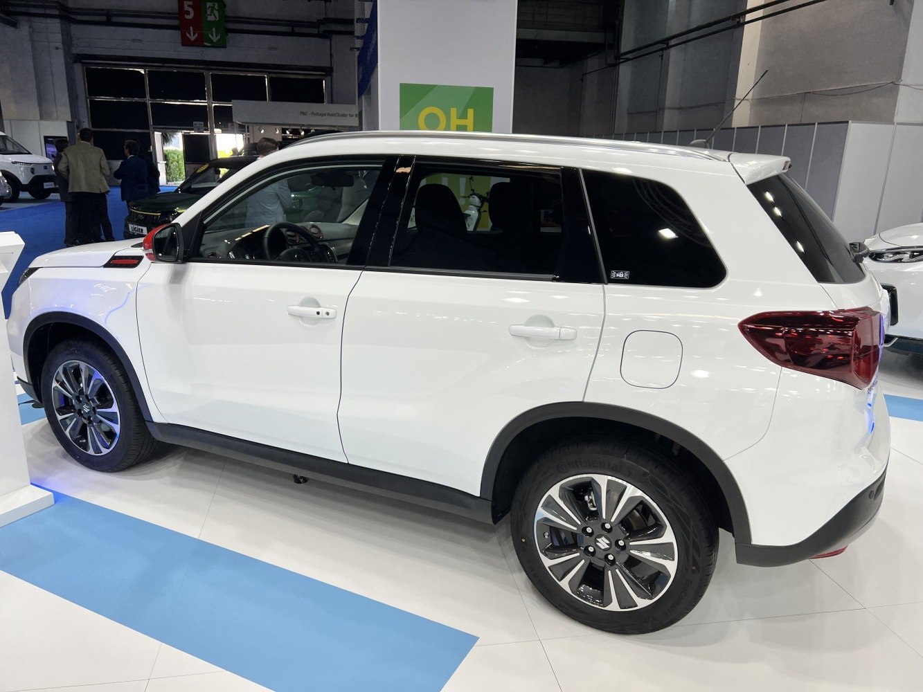 White SUV side profile with modern alloy wheels