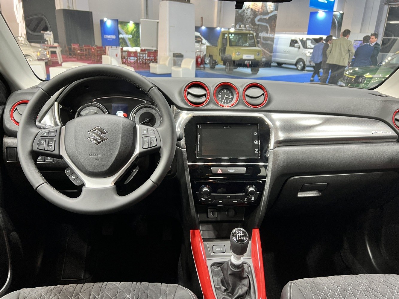 Manual transmission interior with red air vent accents