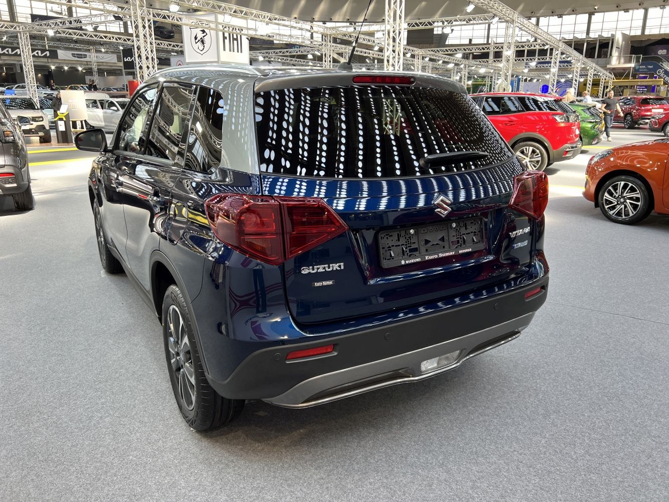 Rear exterior view with taillights and rear bumper design