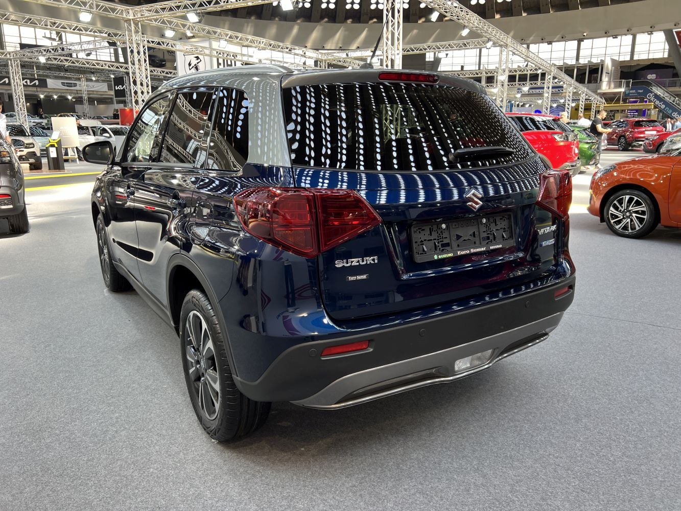Rear view of SUV with distinctive taillights and dual-tone roof.