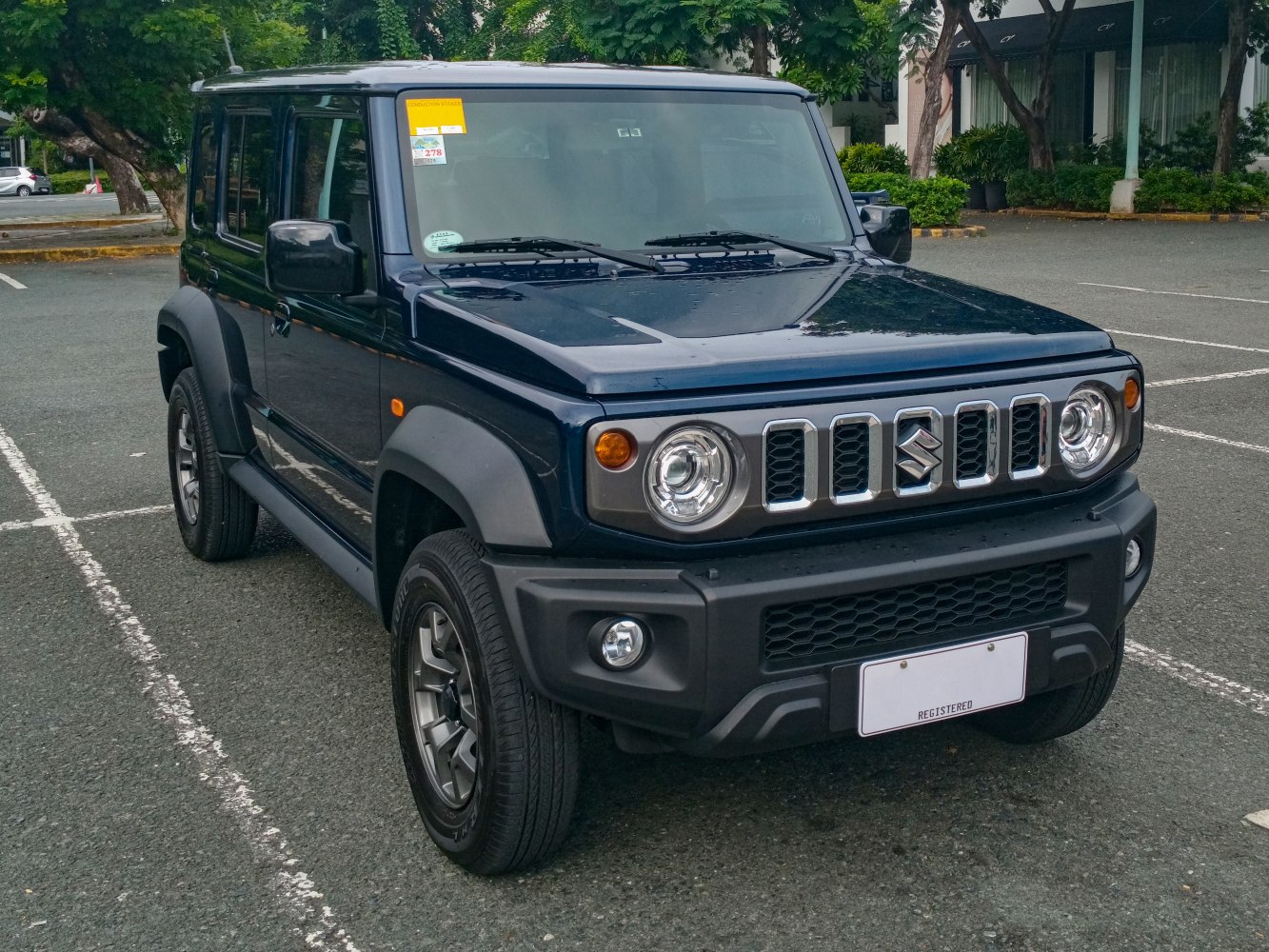 Front view with round headlights and signature grille