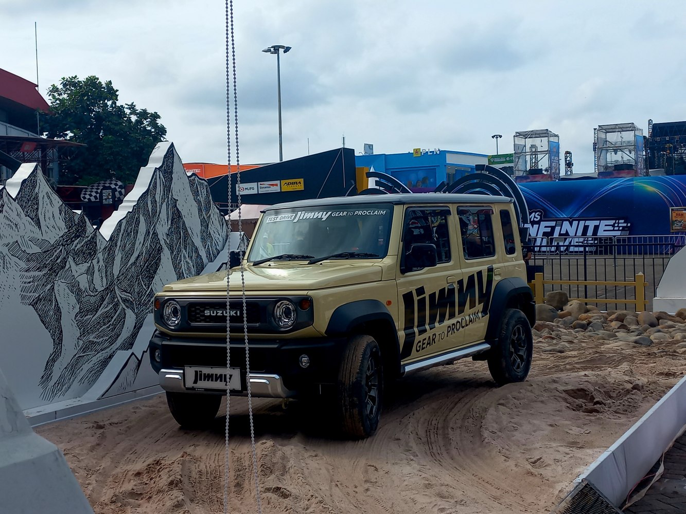 Off-road SUV on sandy terrain with mountain backdrop illustration