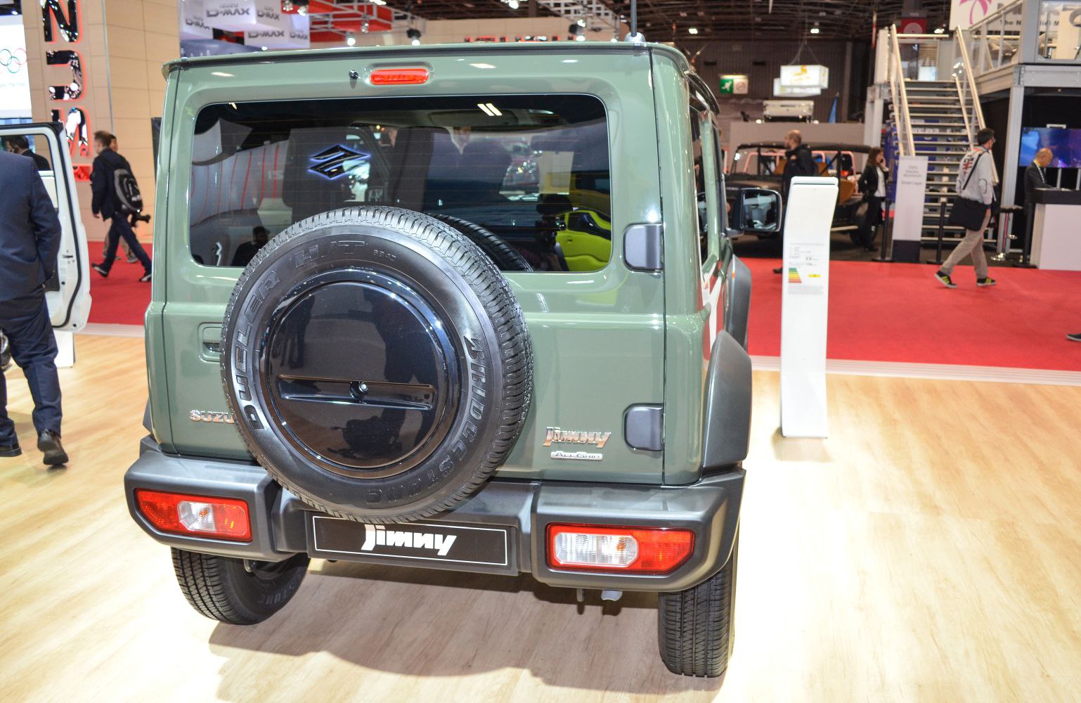 Rear view with mounted spare tire and boxy design