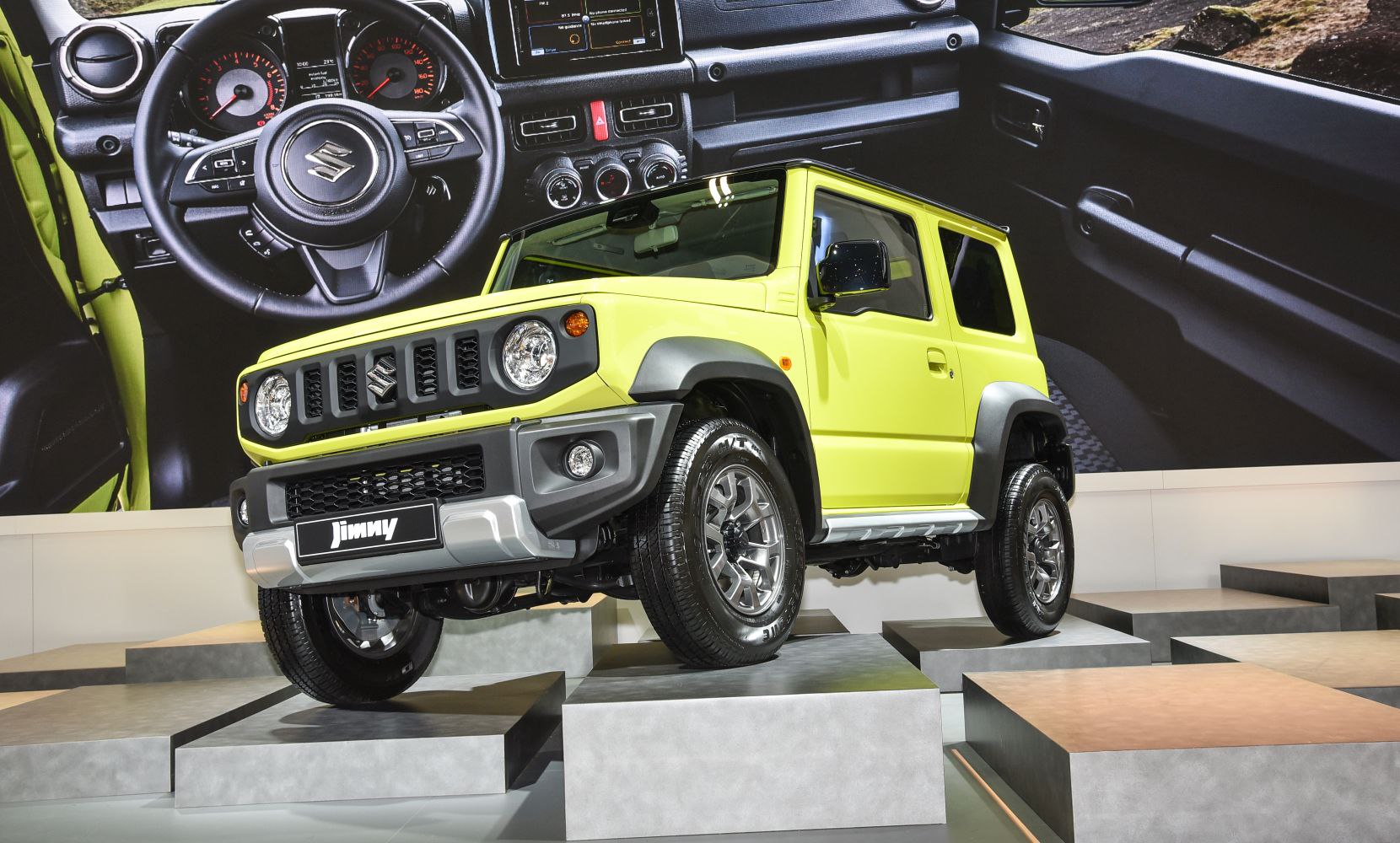 Yellow 3-door off-road SUV with bold design and rugged features