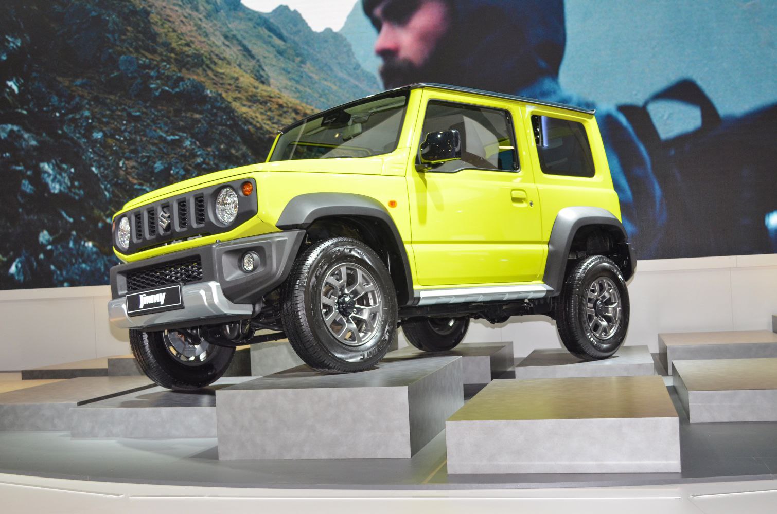 Compact off-road SUV with boxy shape and rugged features