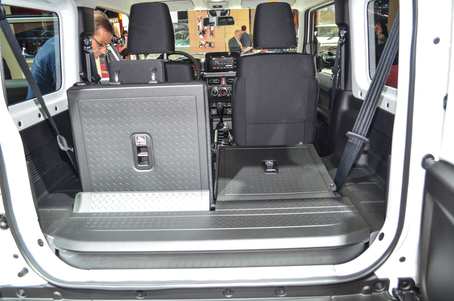 Foldable rear seats and cargo space in compact SUV interior