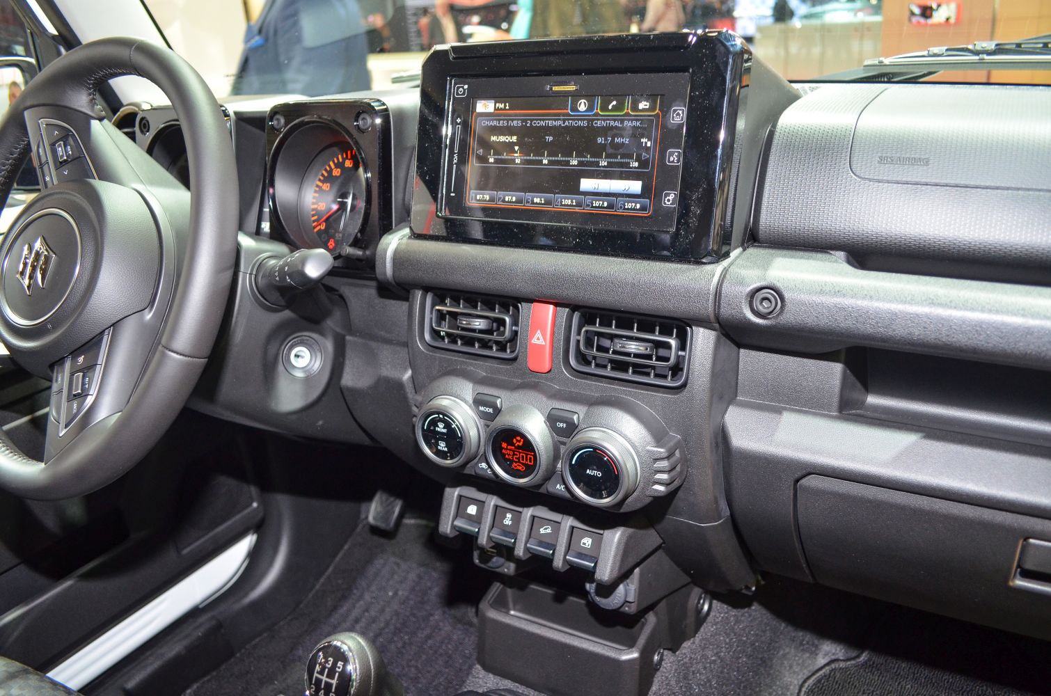 Interior dashboard with infotainment screen and climate controls