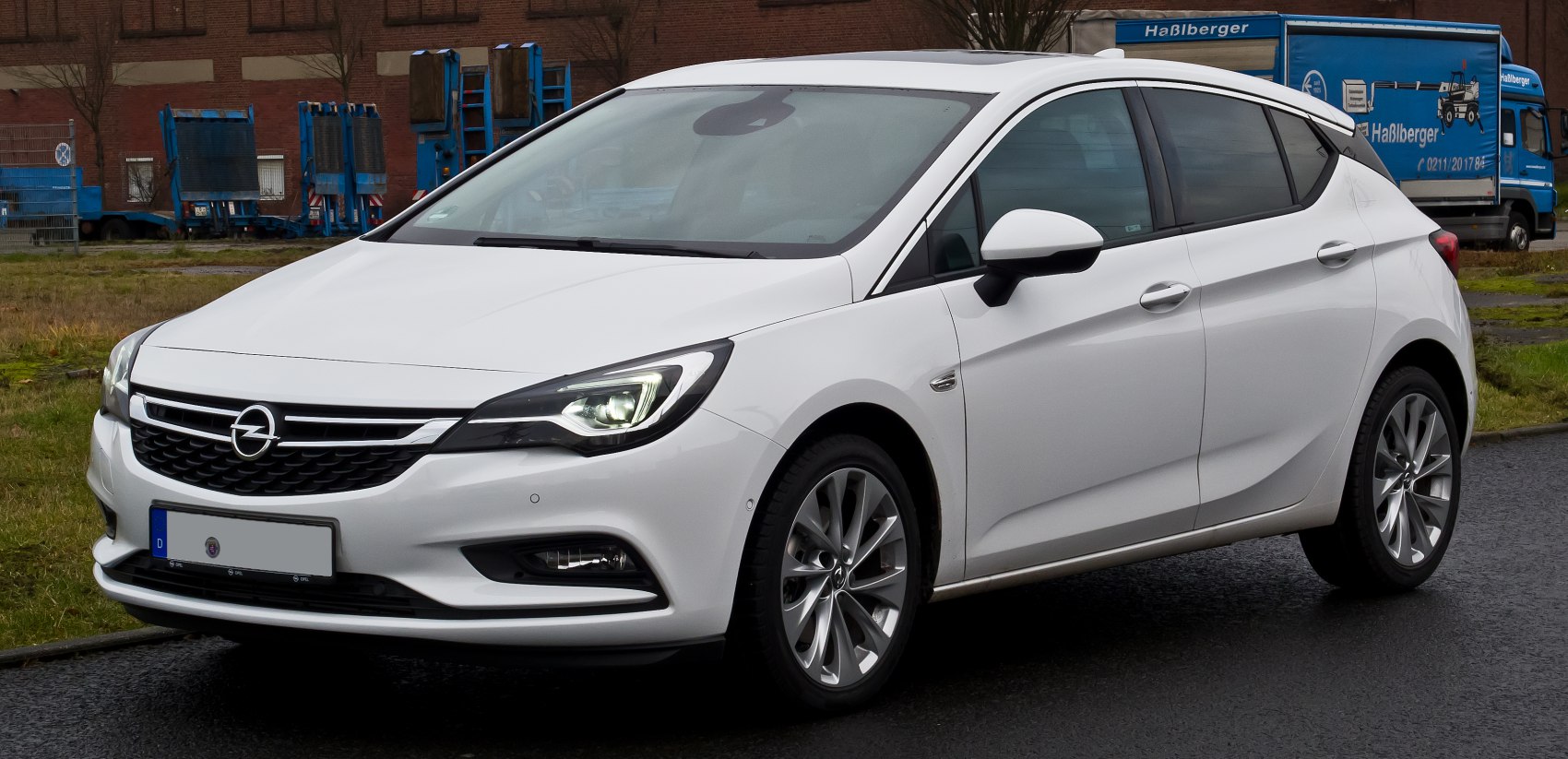 White compact hatchback with LED headlights and alloy wheels
