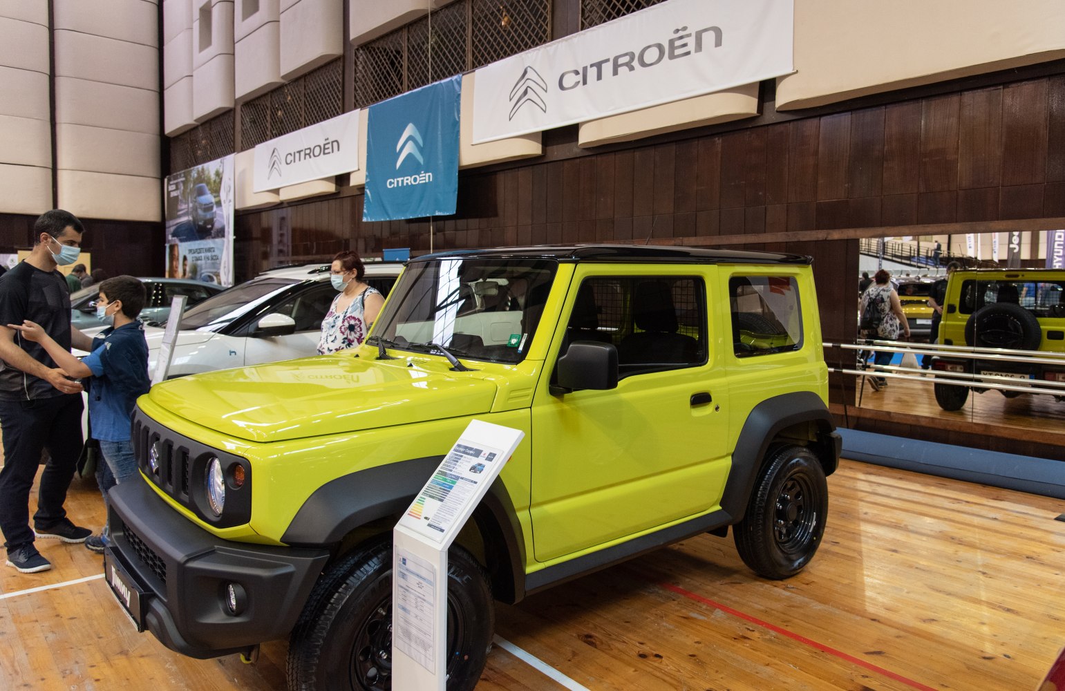 Compact SUV with boxy shape, round headlights, and off-road stance