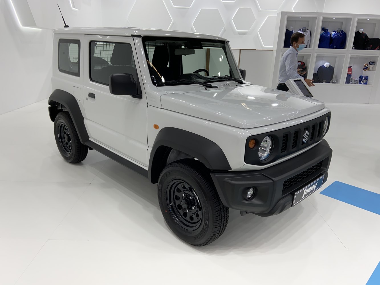 Compact off-road SUV with boxy design and round headlights