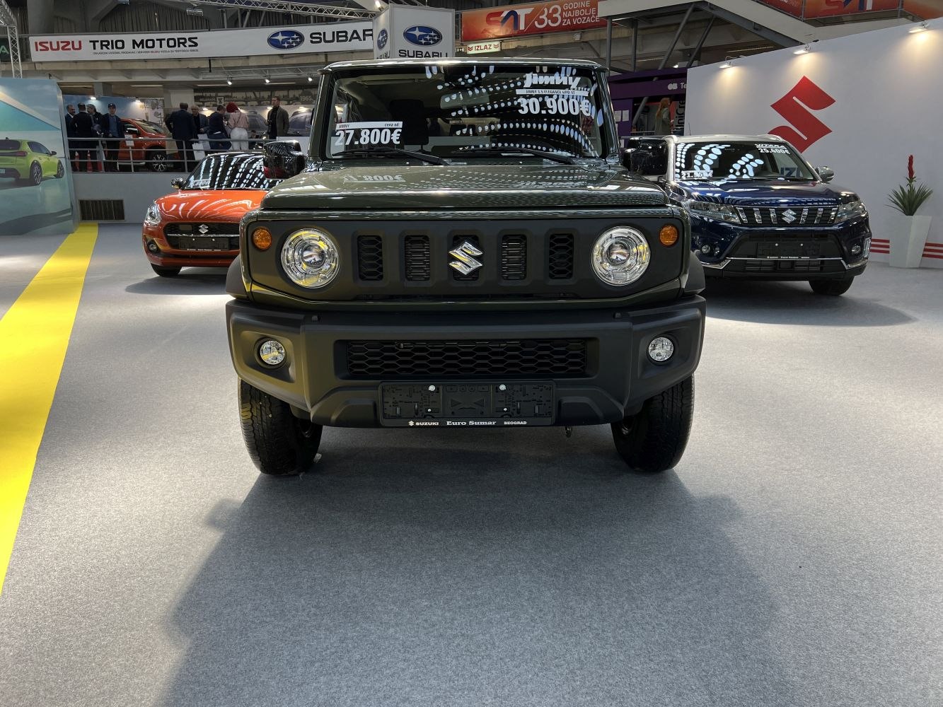 Front grille and round headlights of a compact SUV