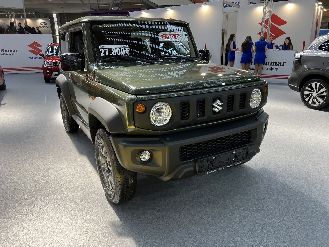 Compact off-road SUV with round headlights and bold front grille