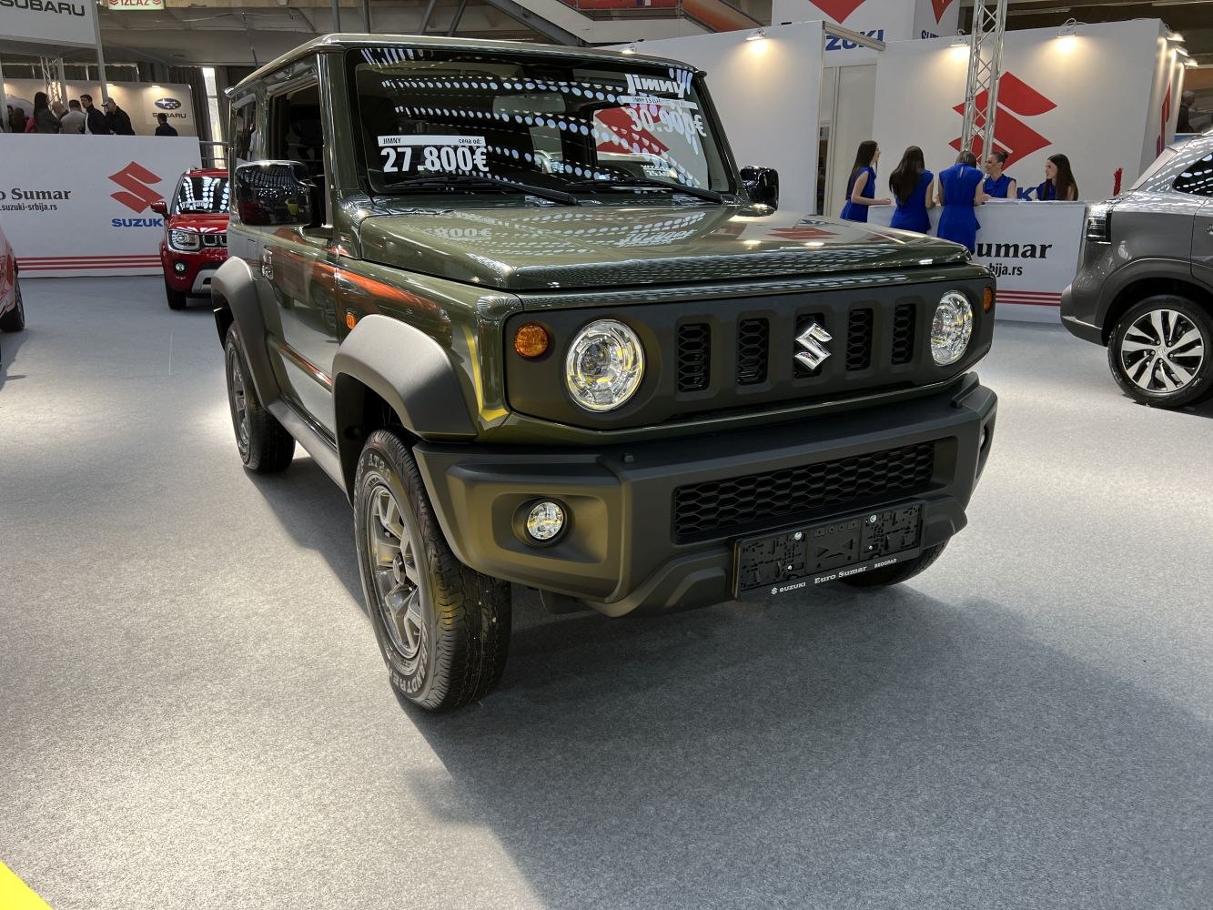 Boxy SUV front with round headlights and rugged design