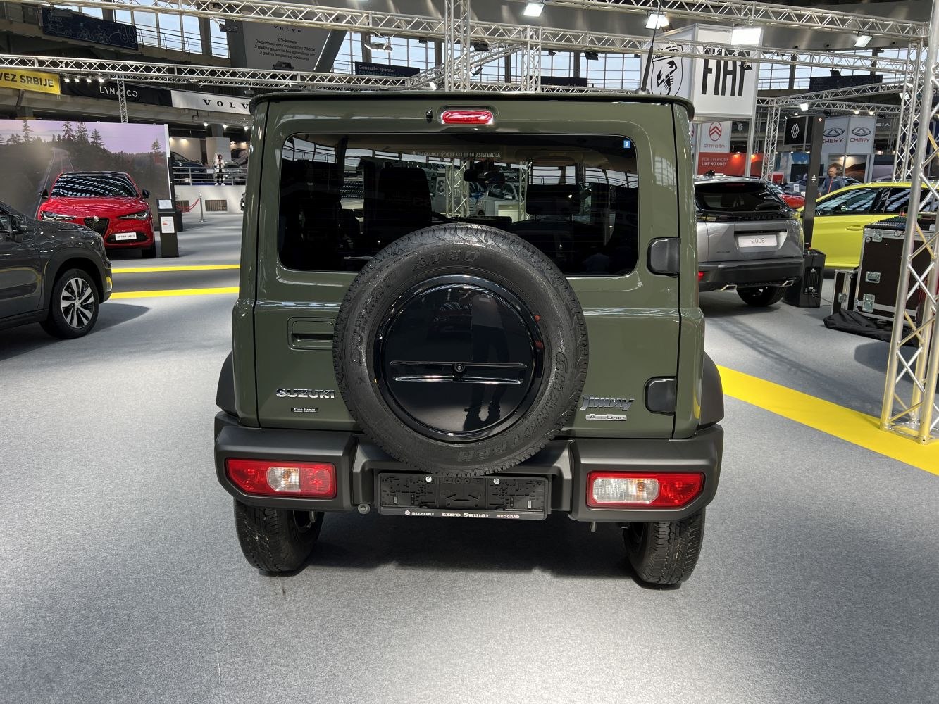 Rear view with mounted spare tire and rear window
