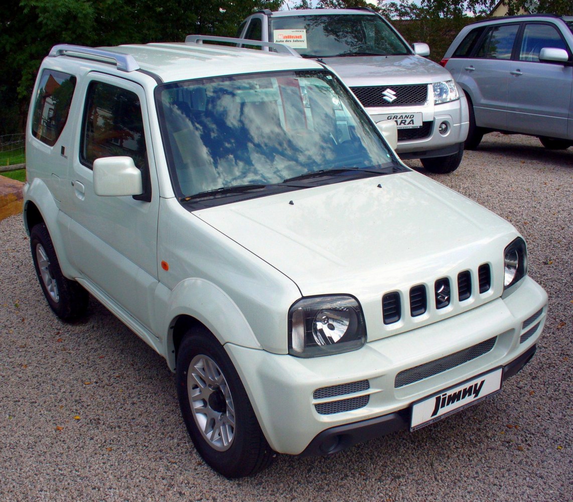 Compact off-road SUV with squared headlights and distinctive grille