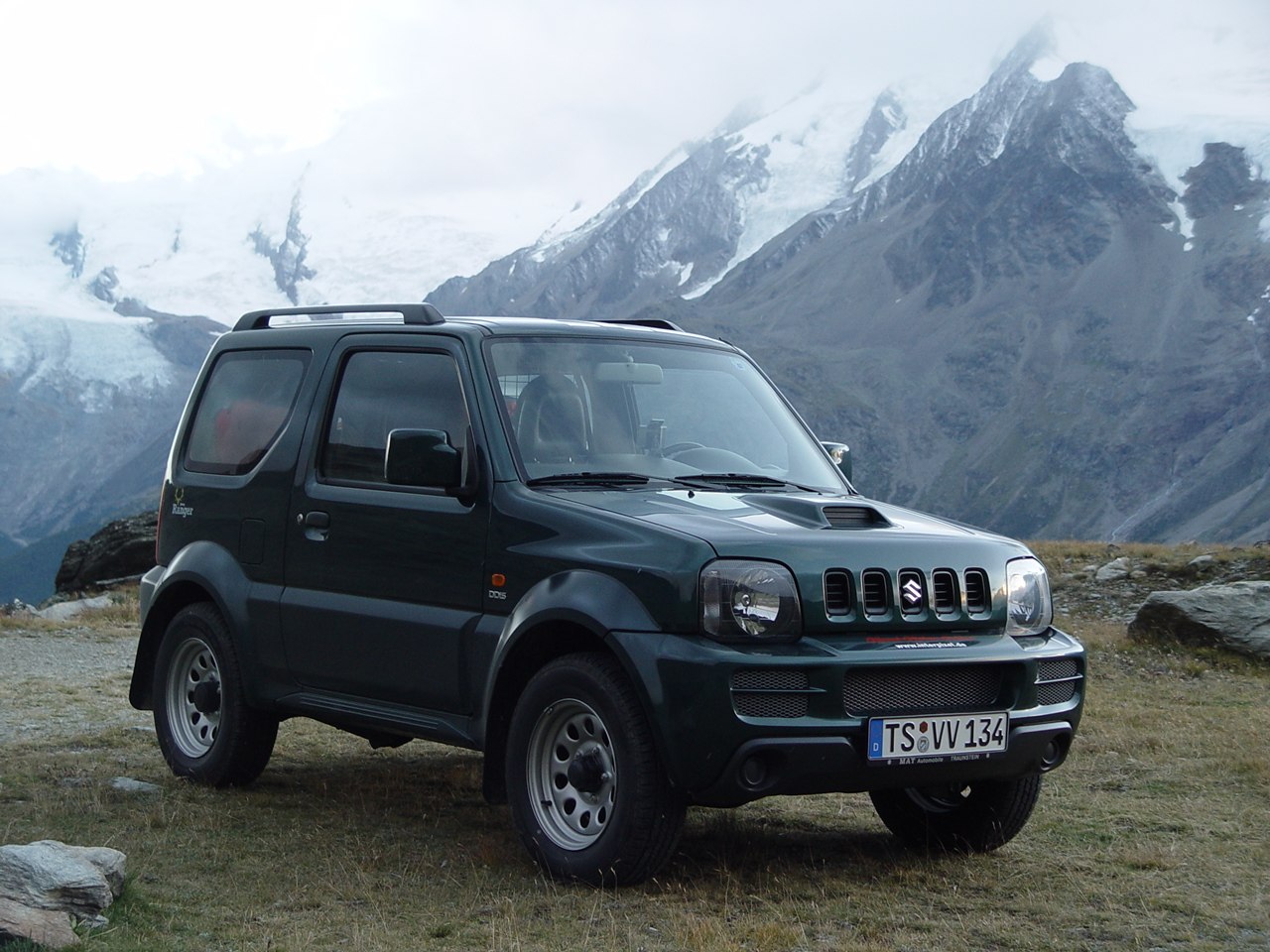 Compact off-road SUV front and side view with rugged design