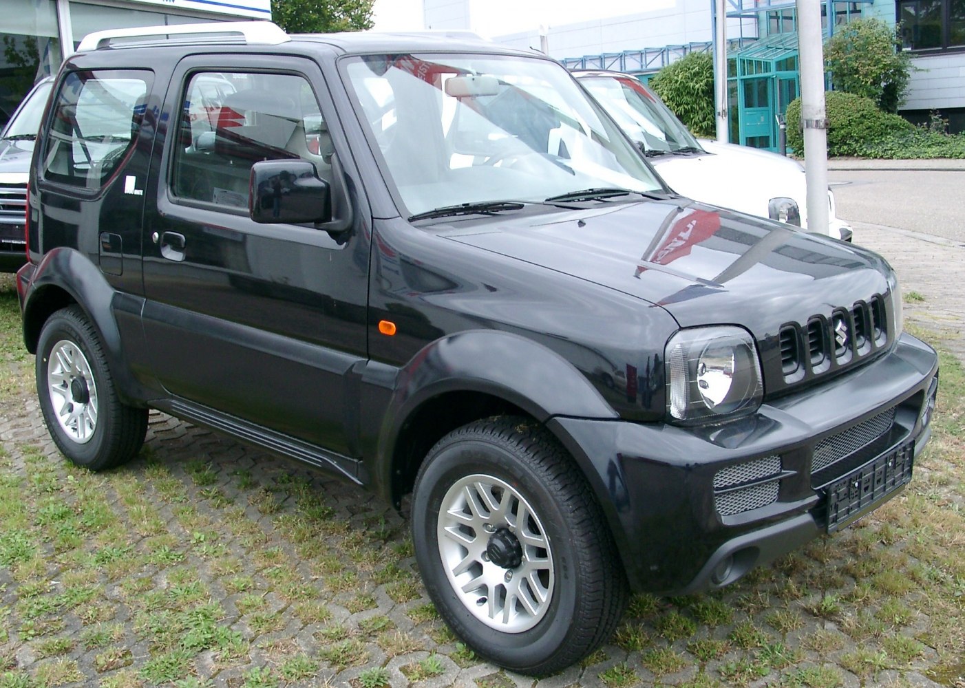 Compact boxy SUV with rugged off-road styling and distinctive front grille
