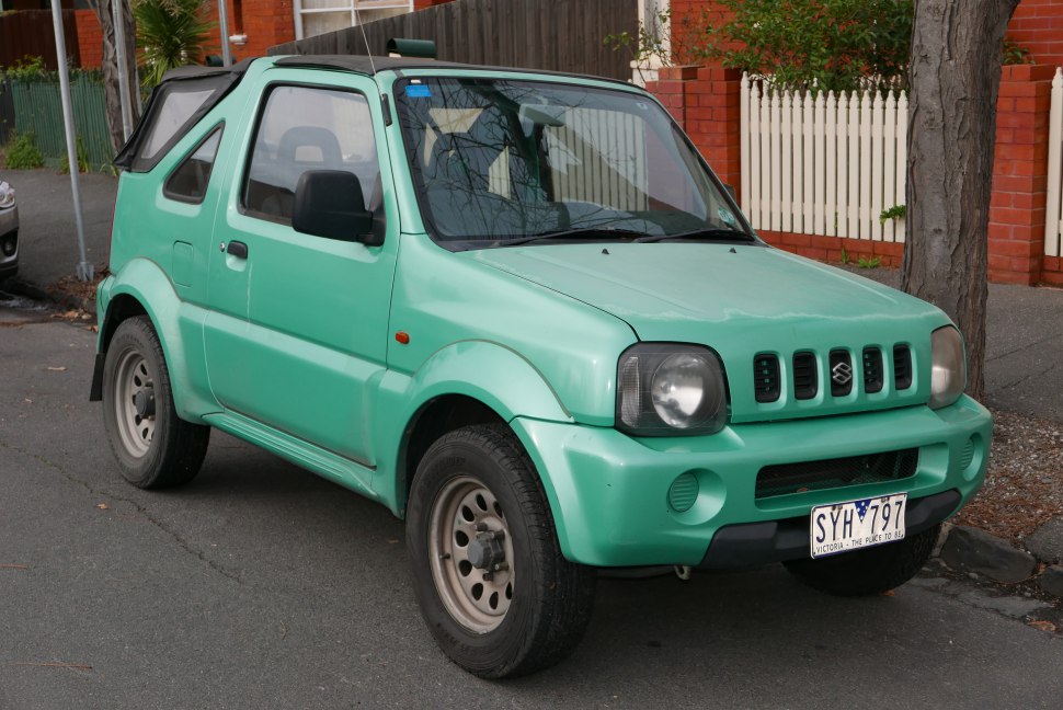 Compact convertible SUV with soft top and distinctive grille