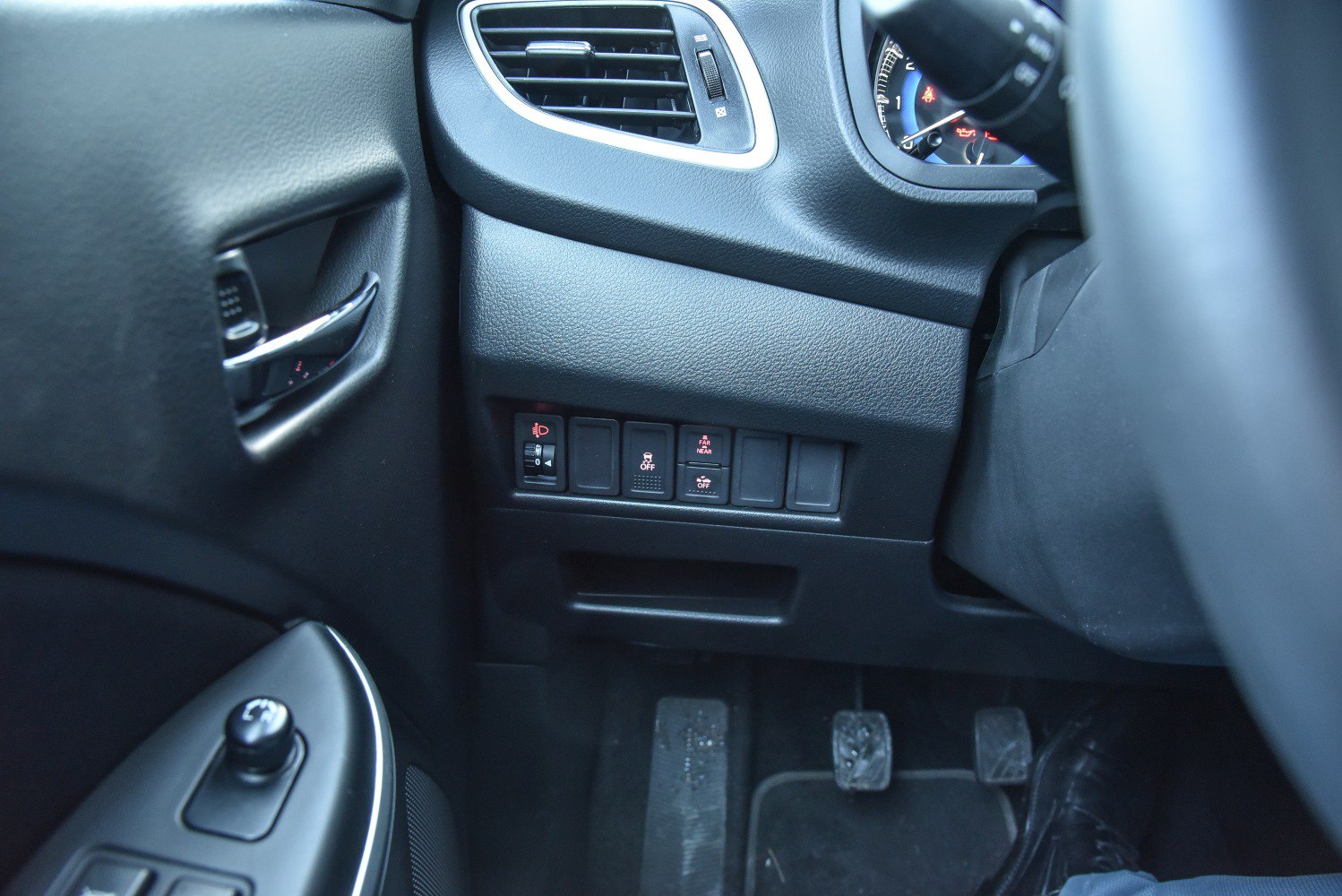 Dashboard control panel with air vent and foot pedals