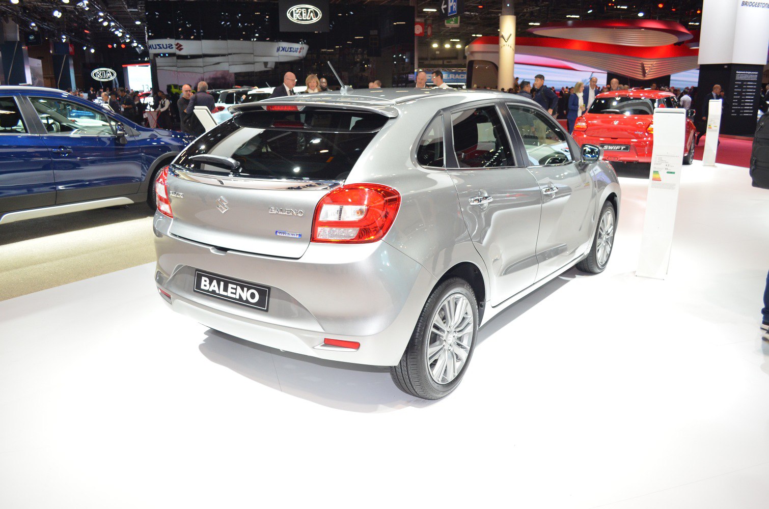Silver hatchback rear with distinctive taillights and alloy wheels