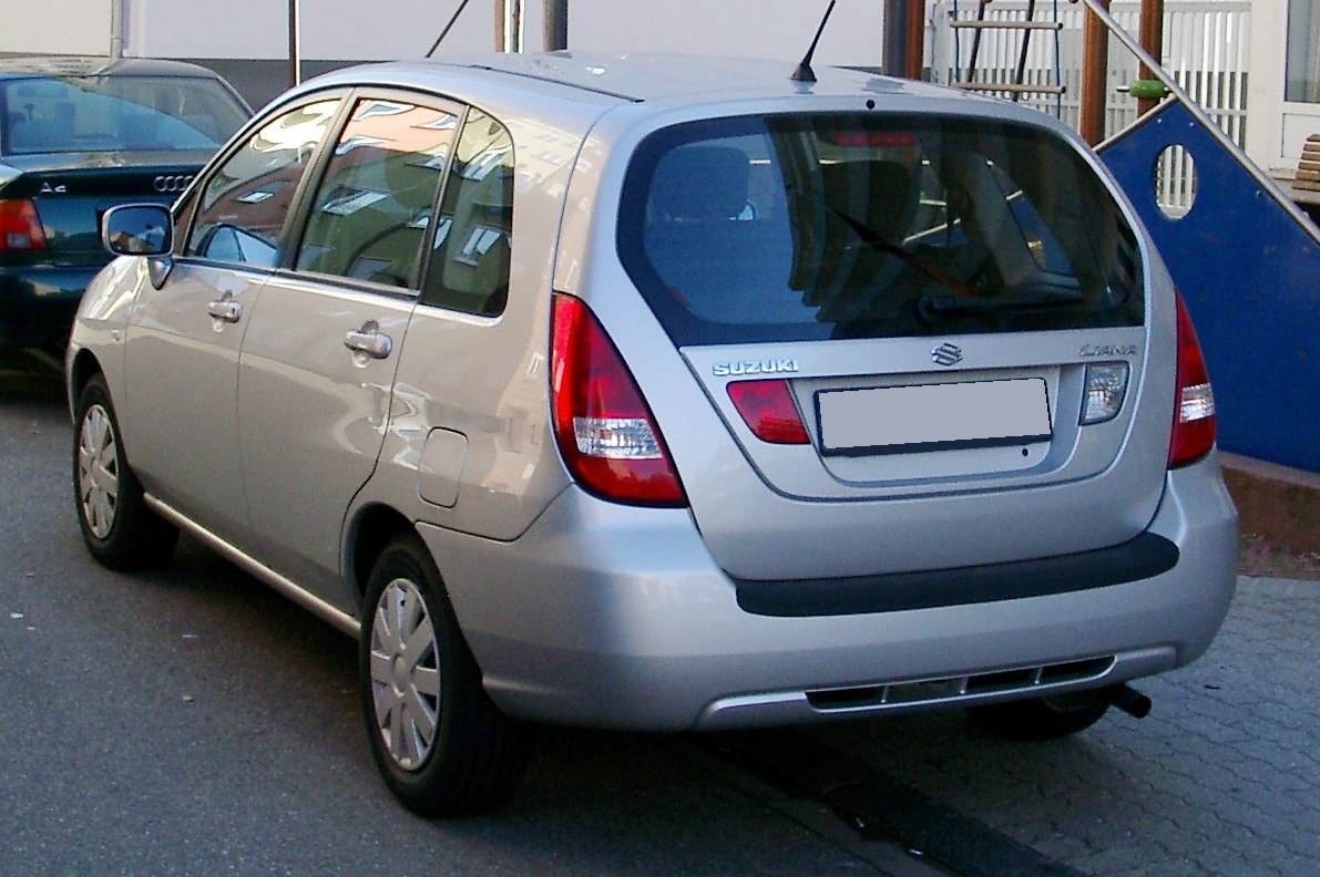 Compact hatchback rear with distinctive taillights and rear window design.
