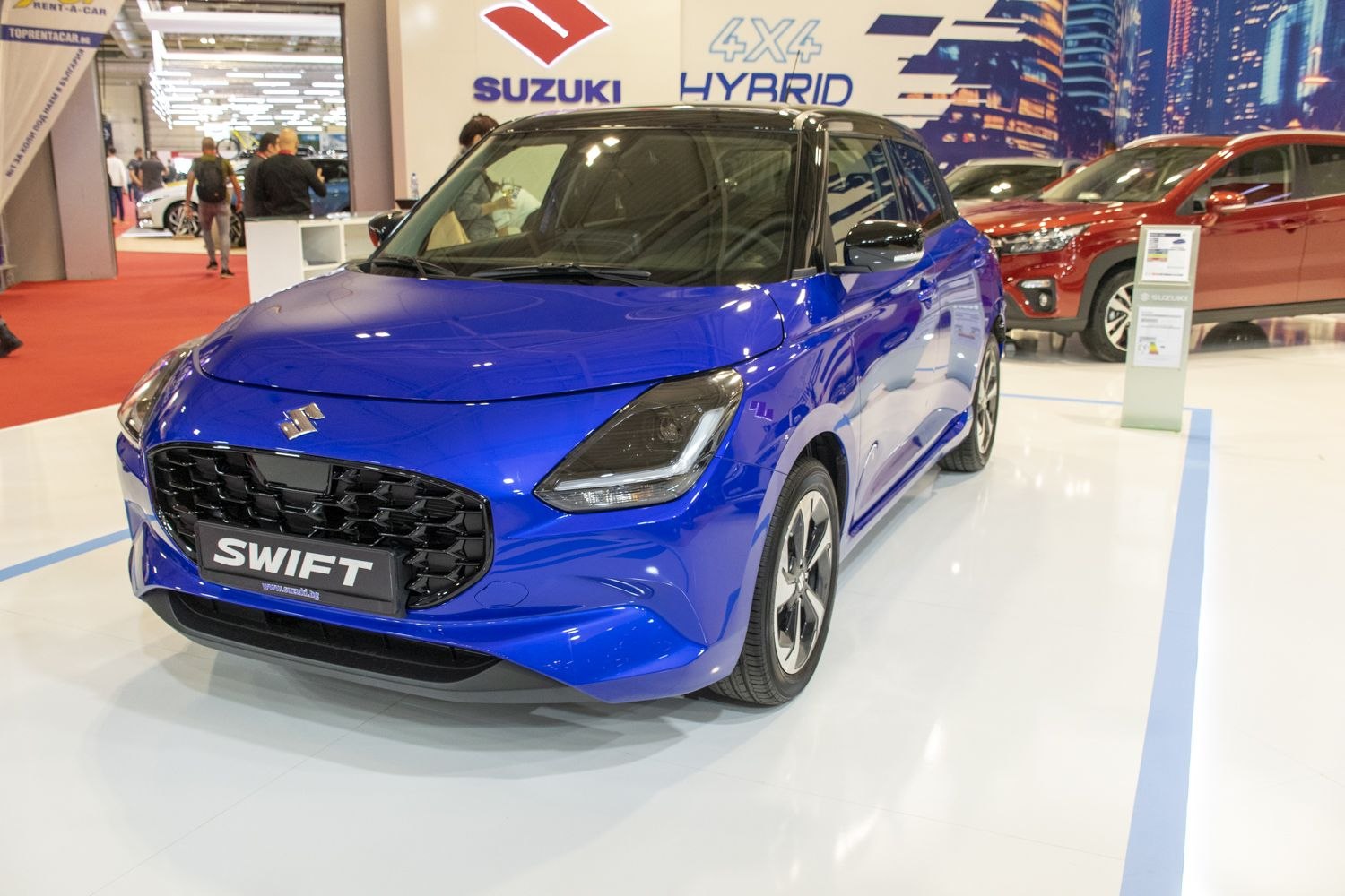 Bold front grille and sleek headlights with hybrid 4x4 branding