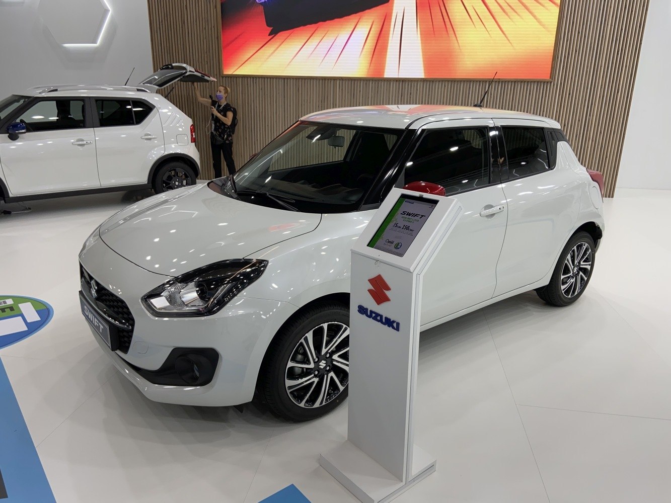 Sleek front headlights and alloy wheels of a compact hatchback