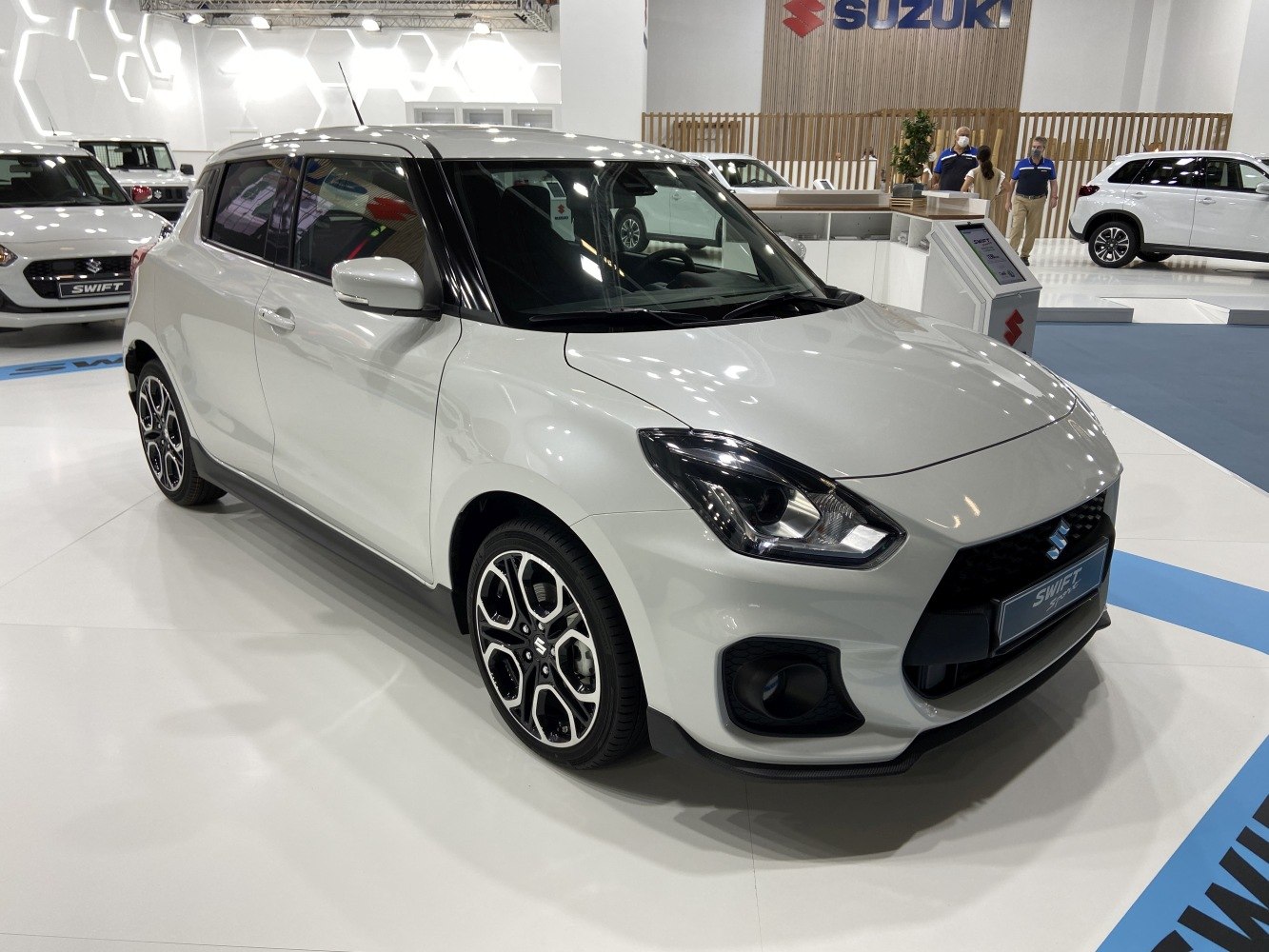 Front side view with distinct headlights and alloy wheels