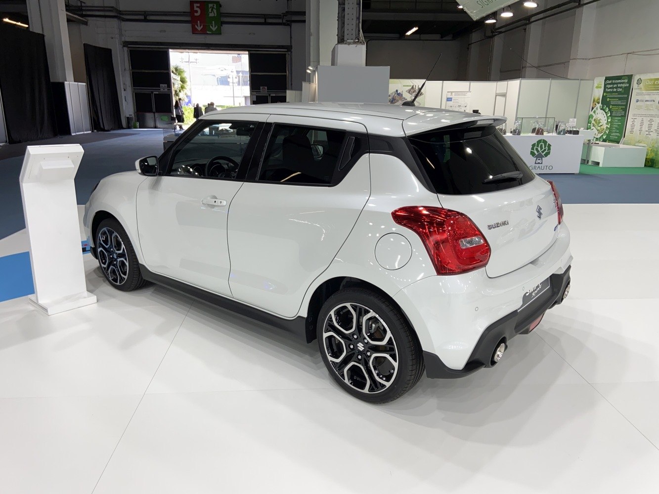 Rear and side exterior with alloy wheels and taillights