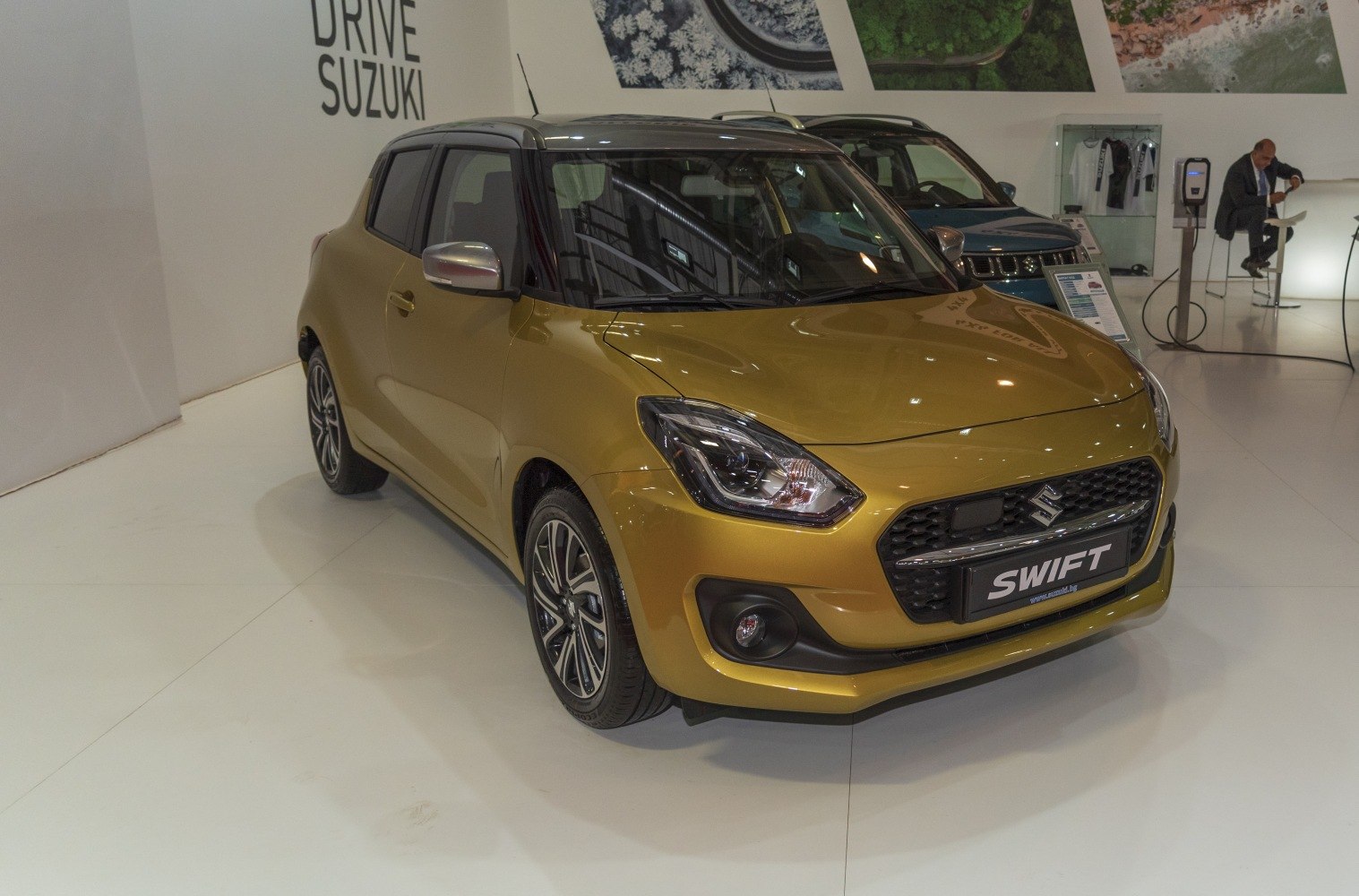 Front-angle view of a compact hatchback with detailed headlights and grille