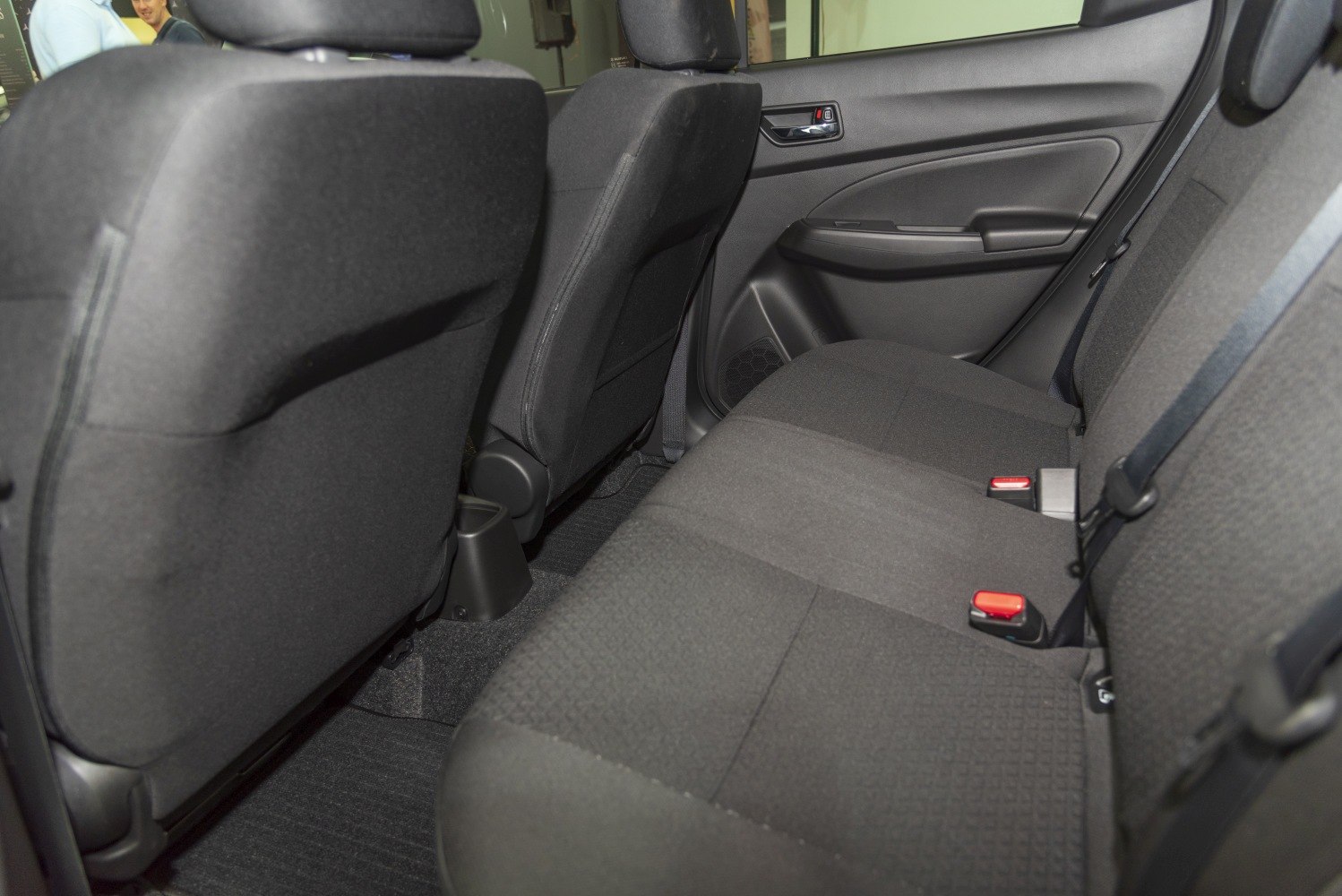 Rear seat fabric upholstery and door panel with seatbelt detail