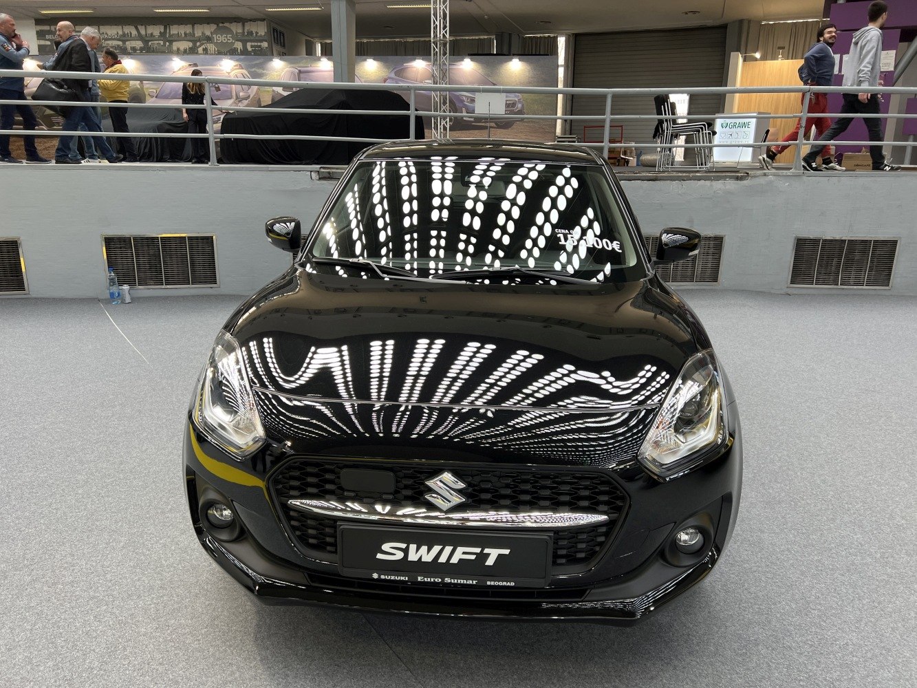 Front view of Suzuki Swift VI facelift 2020 with LED headlights and grille