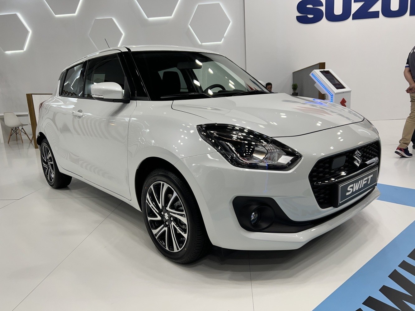 Front view with distinctive headlamps and alloy wheels