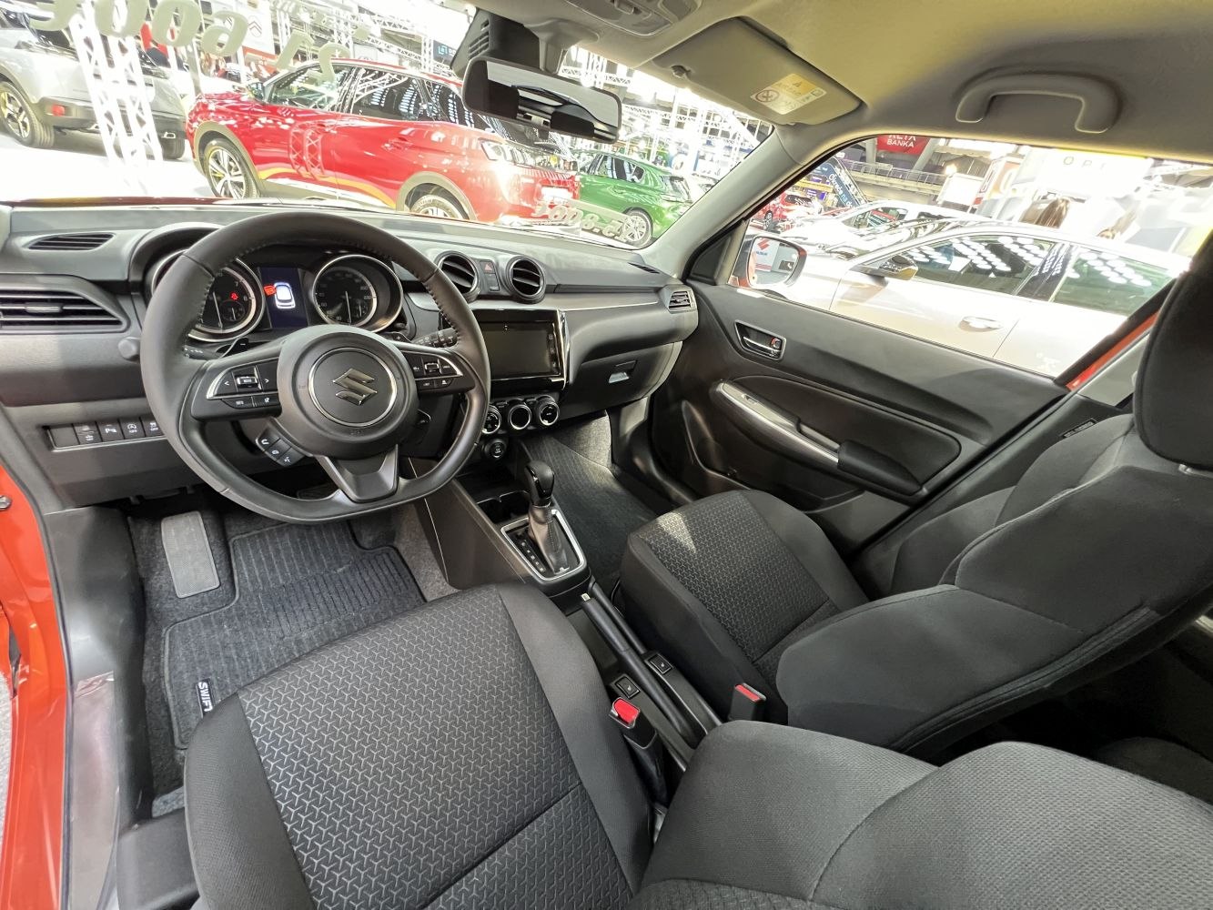 Car steering wheel, dashboard, and front fabric seats